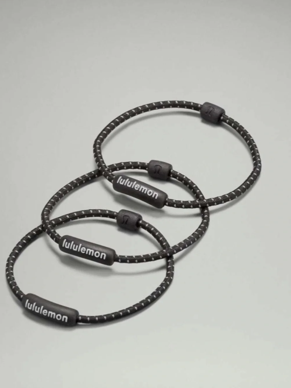 Lululemon Black Silicone Hair Tie Trio with Reflective Dots